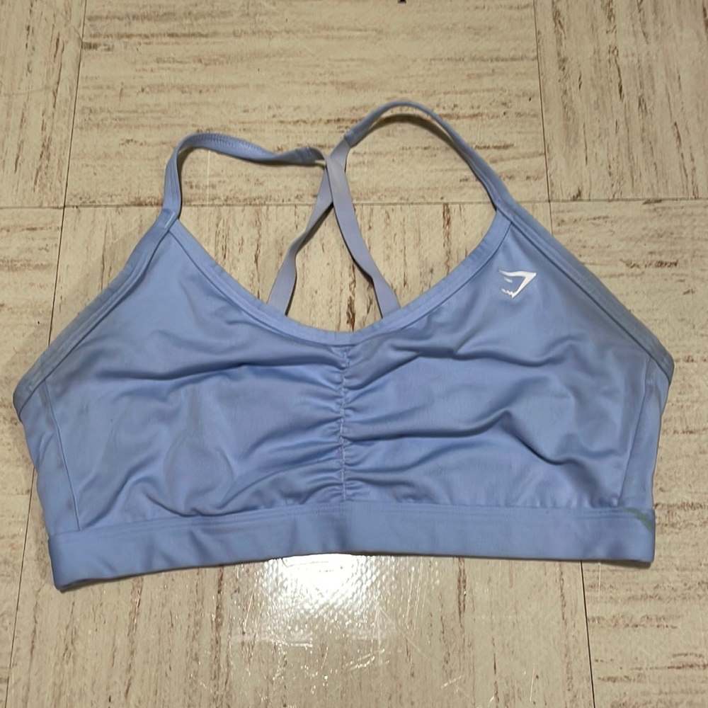 light blue gymshark sports bra, size M